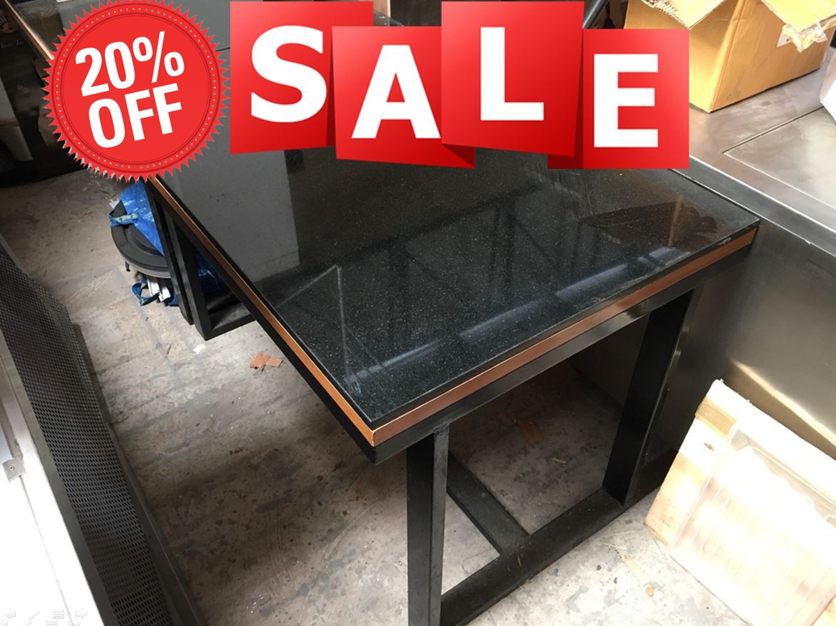 High quality steel frame tables with black granite bench tops.