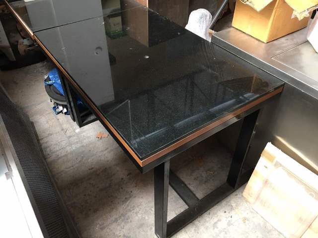 HEAVY STEEL FRAME RESTAURANT TABLES WITH THICK BLACK GRANITE TABLE TOPS
